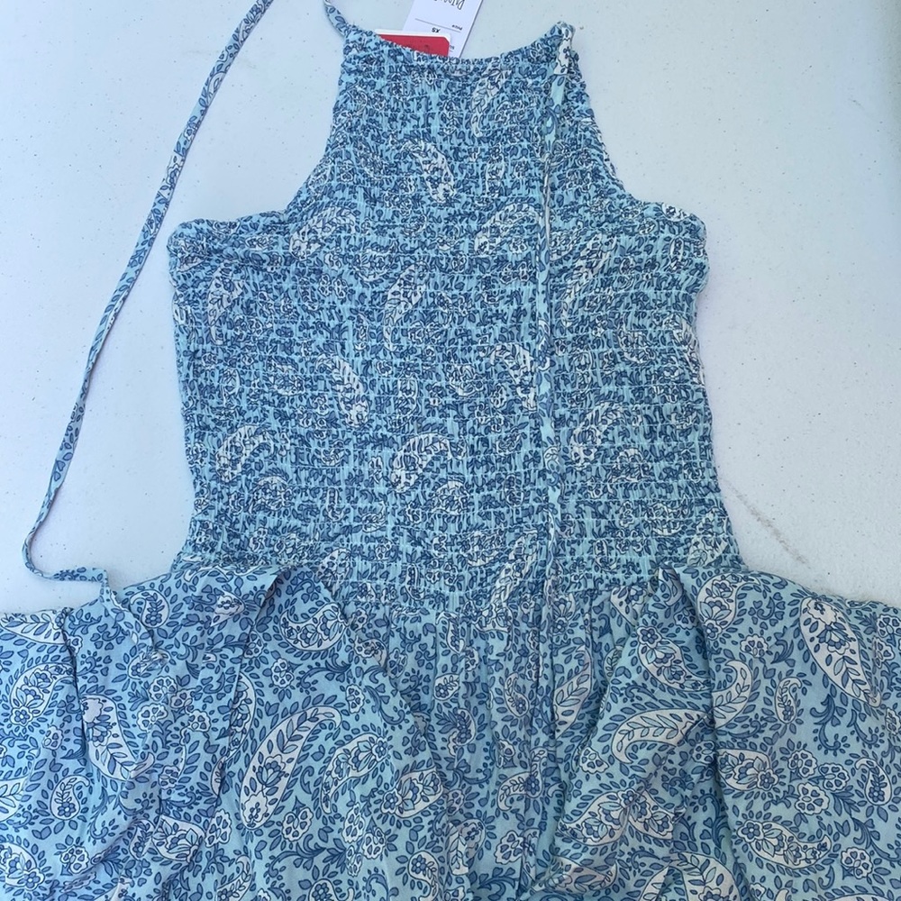 Romper that ties in back has pants